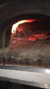 Le four à bois en pleine flambée